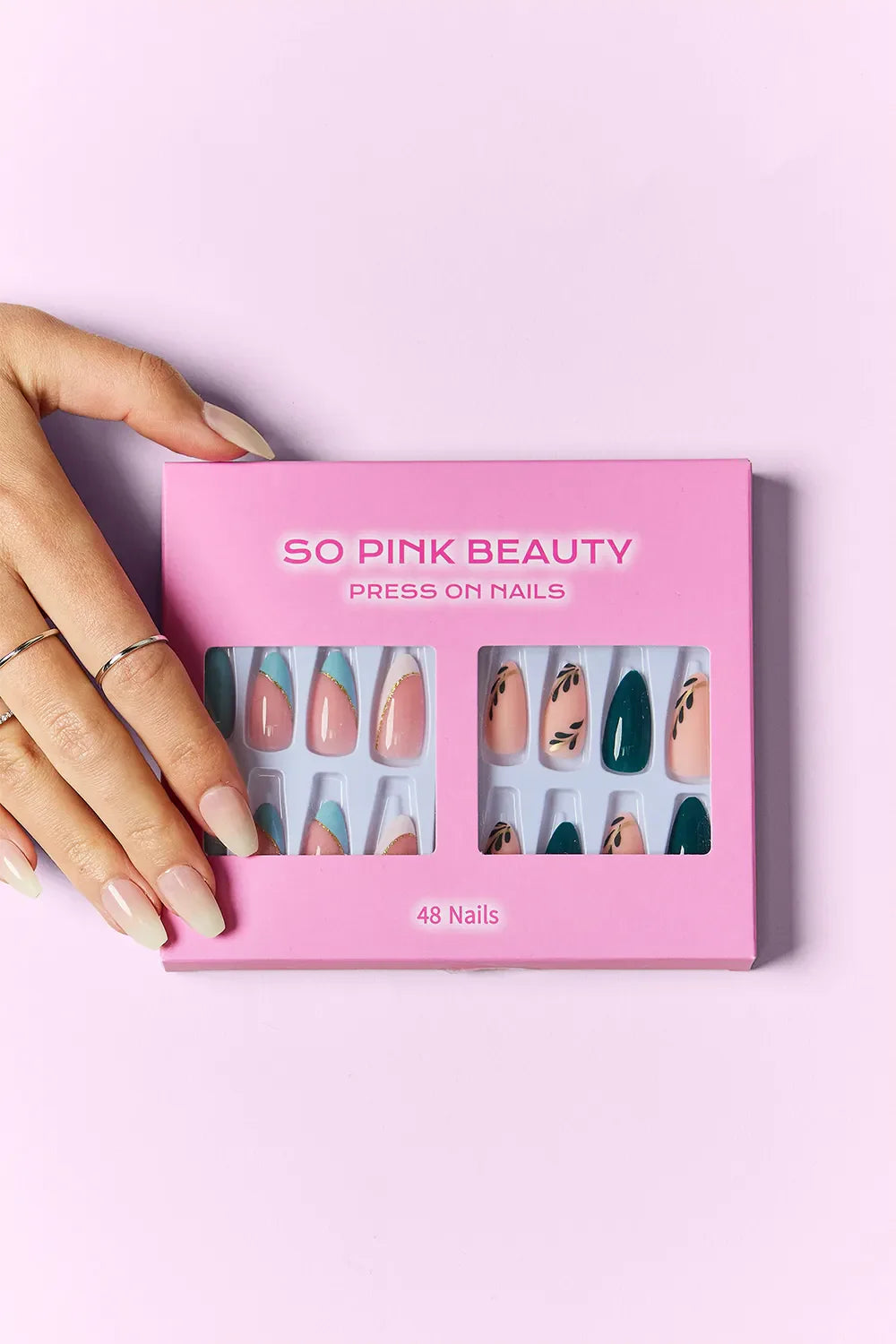So Pink Beauty Press On Nails 48-piece set with two stylish designs and adhesive glue in a pink box