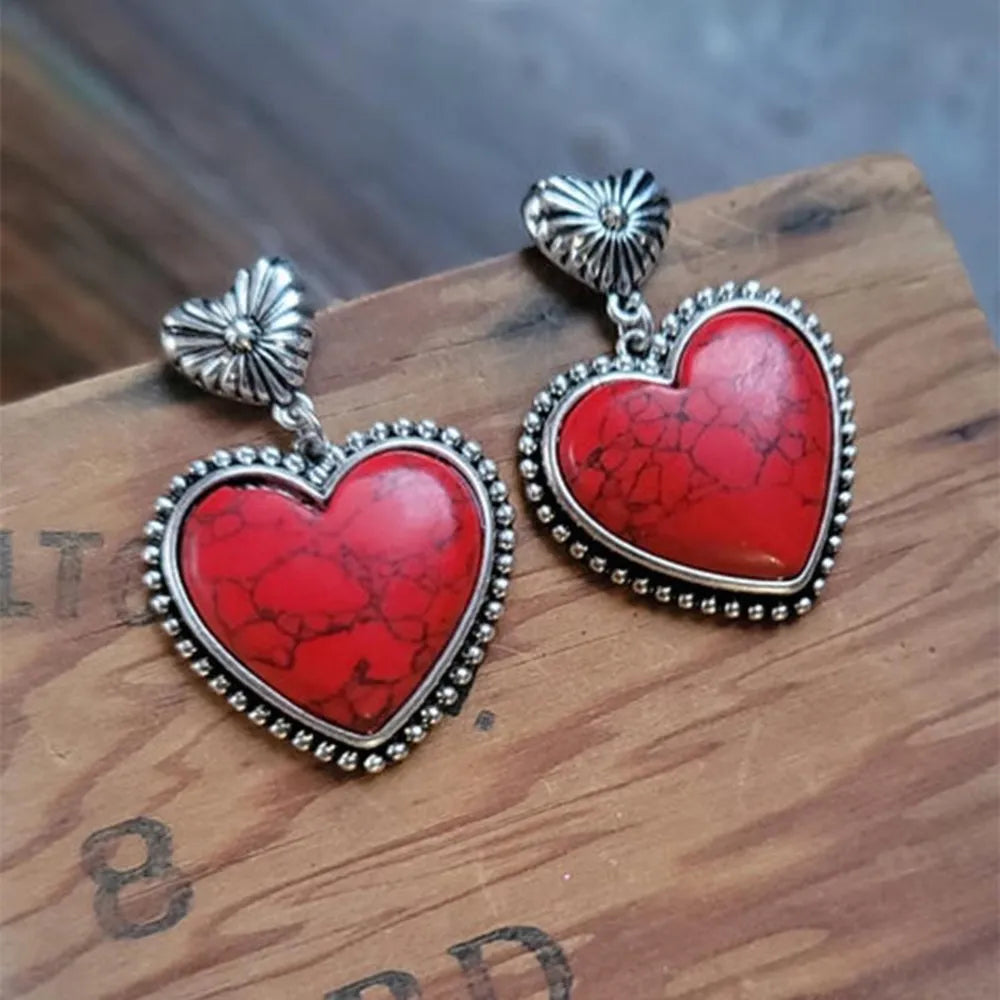 Artificial turquoise alloy heart-shaped dangle earrings with silver-plated detailing