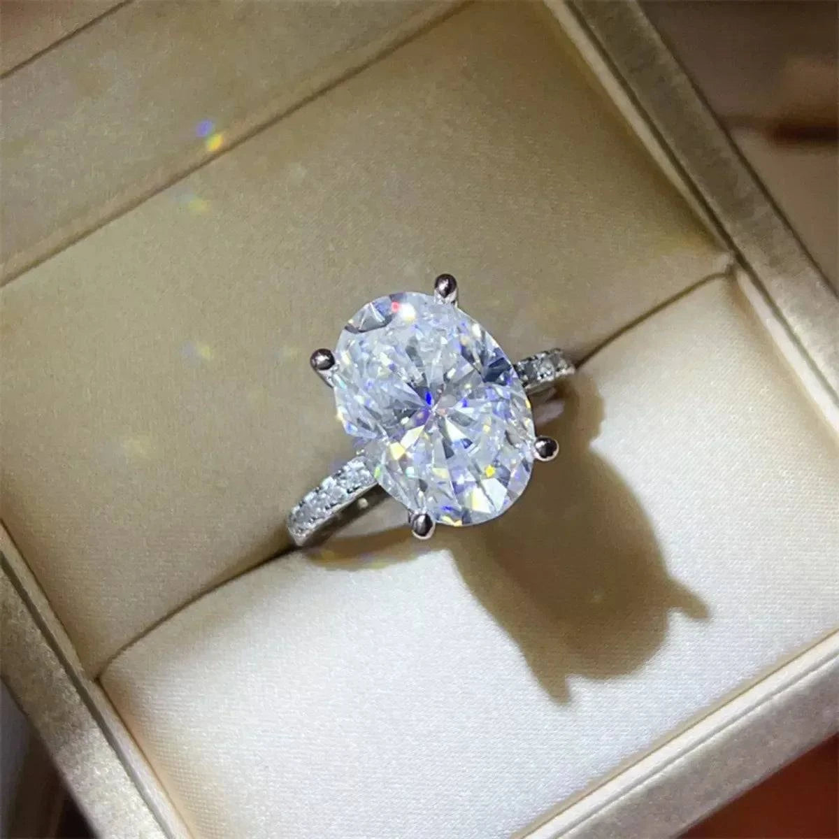 8 Carat Moissanite 925 sterling silver ring with platinum plating in a jewelry box