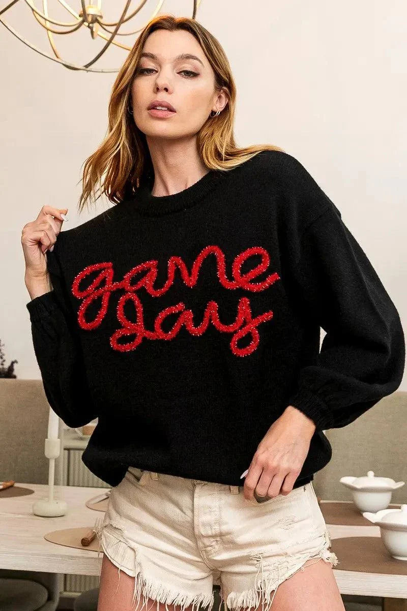 BiBi Game Day Metallic Letter SweaterShow your team spirit in style with this Game Day Metallic Letter Sweater. The metallic letter design adds a touch of glamour and sparkle to this sweater, perfect foRedemption By Ashley NorthGame Day Metallic Letter Sweater