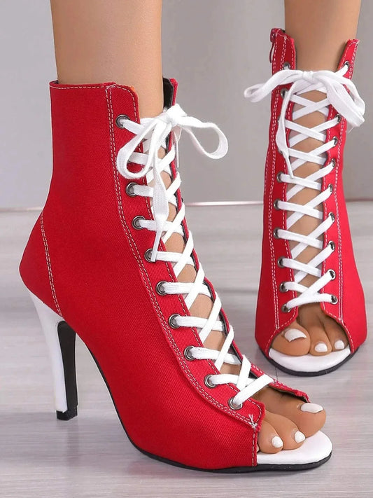 Red canvas peep toe stiletto boots with white lace-up ankle design and high heels