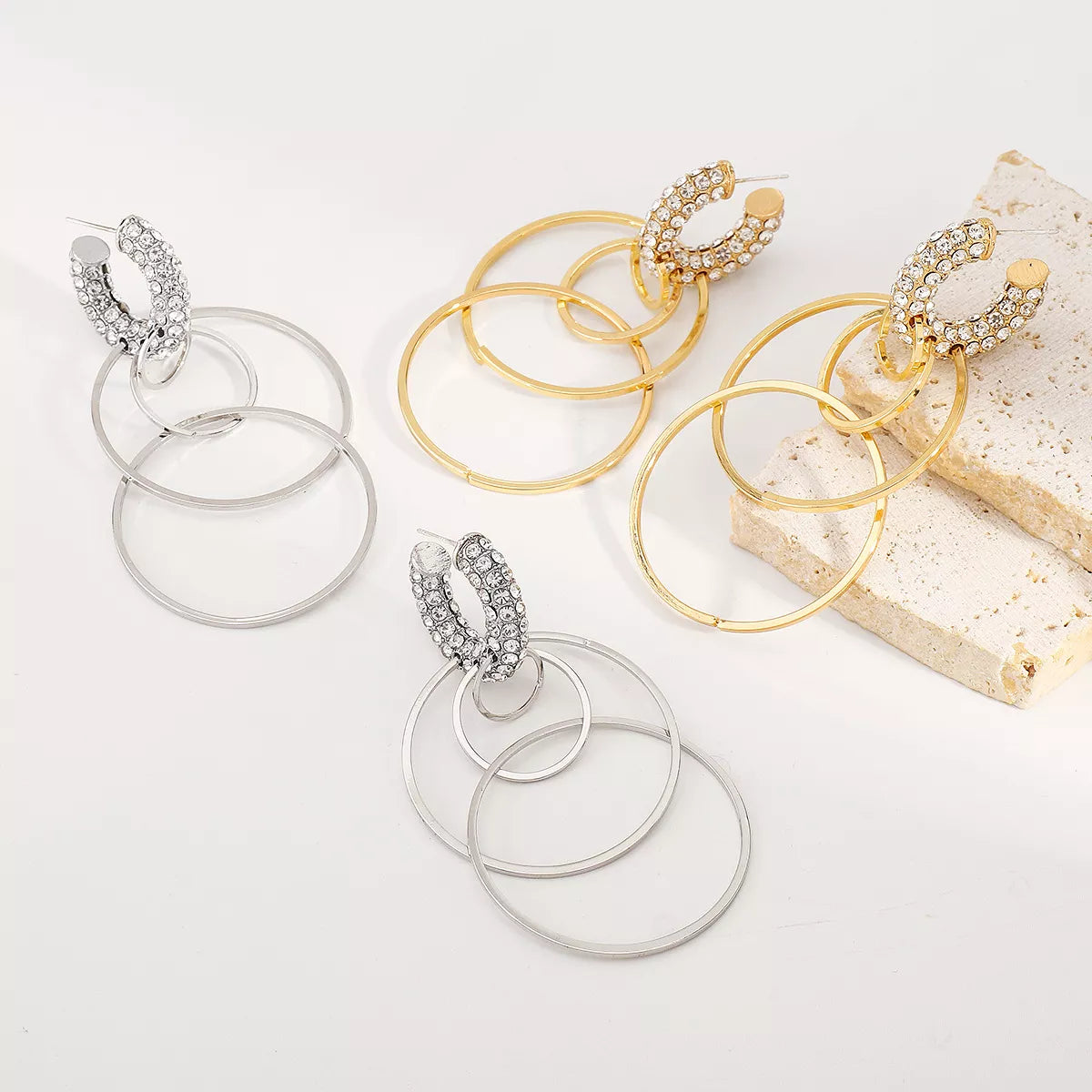 Rhinestone hoop dangle earrings in gold and silver 18K gold-plated alloy with triple hoop design