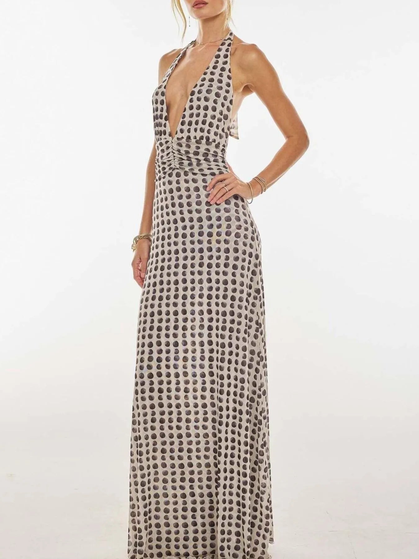 Floral Maxi Dress with Halter Neck and Deep V Design.
