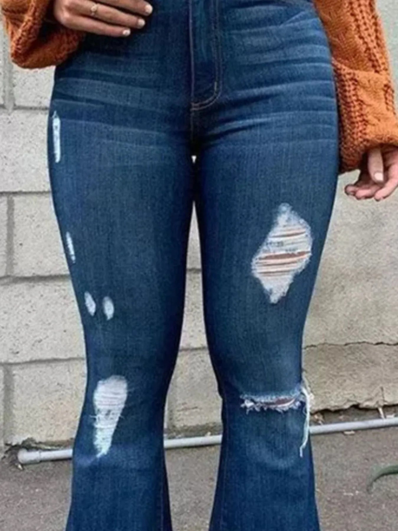 Full Size Plus Size Distressed Flare Jeans with Raw Hem.