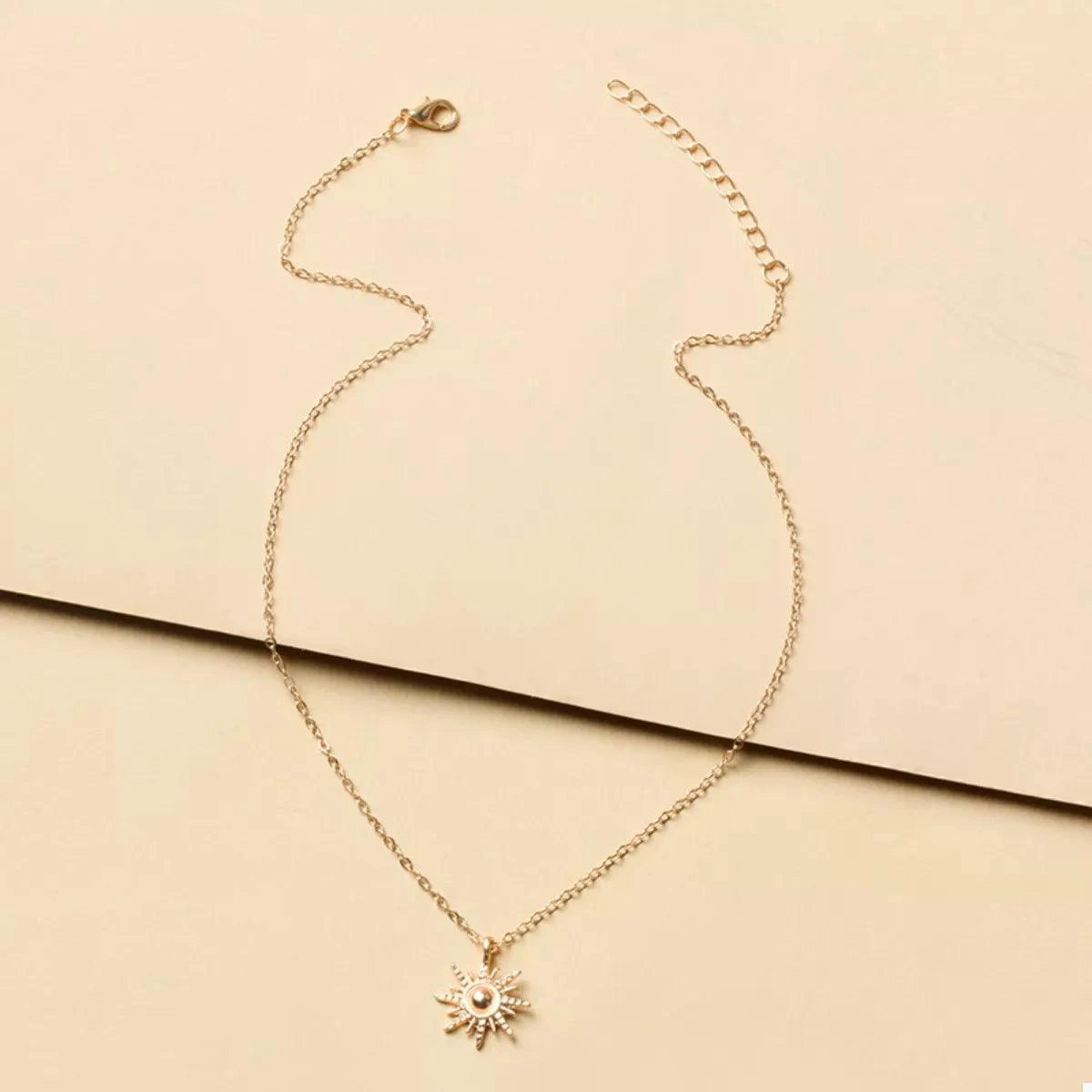 Sunburst Pendant NecklacePieces:1-piece
Material:18K Gold-Plated,Zinc alloy,Silver-plated
Care instructions:Avoid wearing during exercise, as sweat will react with the jewelry to produce silSunburst Pendant Necklace