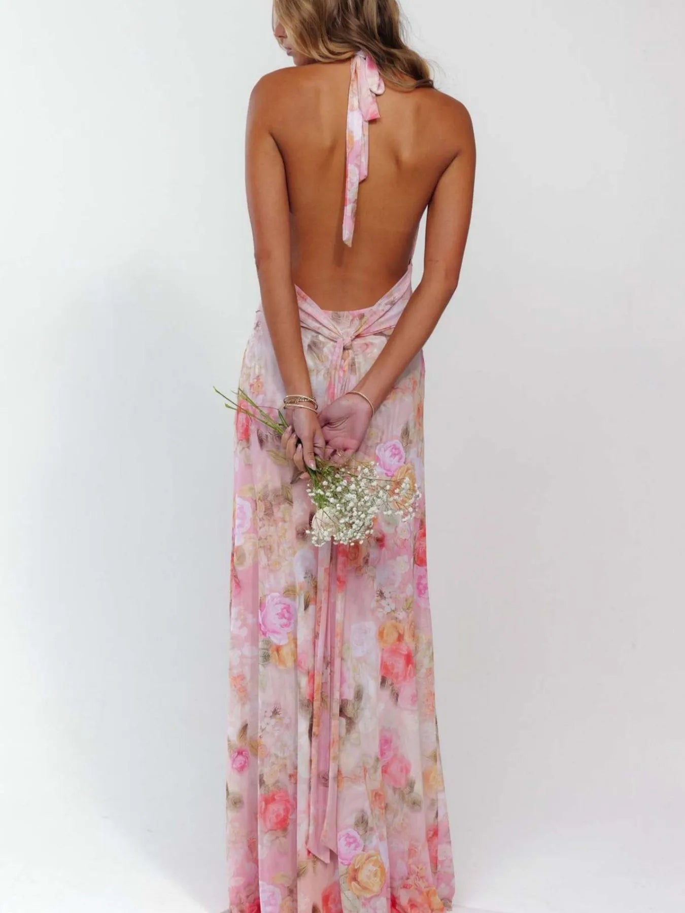 Floral Maxi Dress with Halter Neck and Deep V Design.