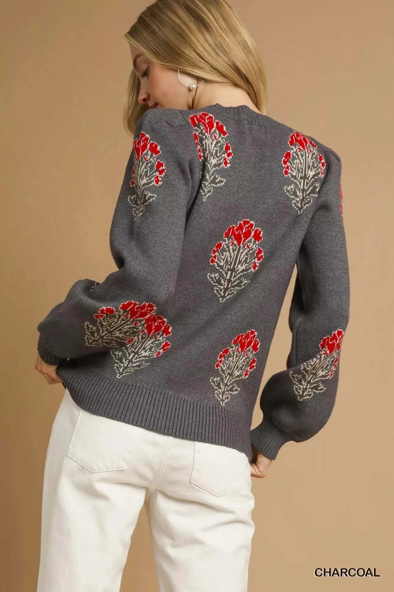 Umgee Single Flower Stem charcoal sweater with red floral jacquard design on back and sleeves